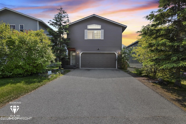 19700 Highland Ridge Dr, Eagle River, AK 99577 - traditional-style home featuring driveway and an attached garage