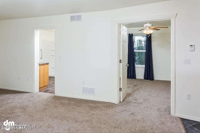 3900 N Mirmar St, Wasilla, AK 99623 - carpeted spare room featuring baseboards and ceiling fan