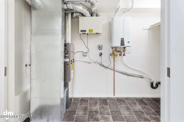 3900 N Mirmar St, Wasilla, AK 99623 - utility room with tankless water heater