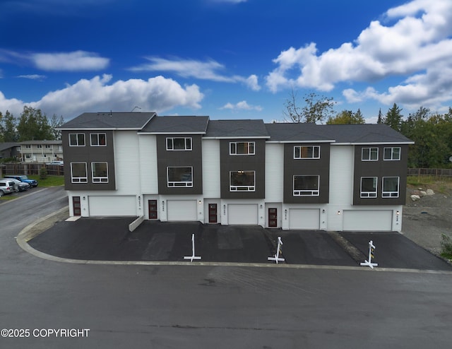 3680 Little Bear Pl Unit 8, Anchorage, AK 99504 - view of front of home featuring driveway and a garage