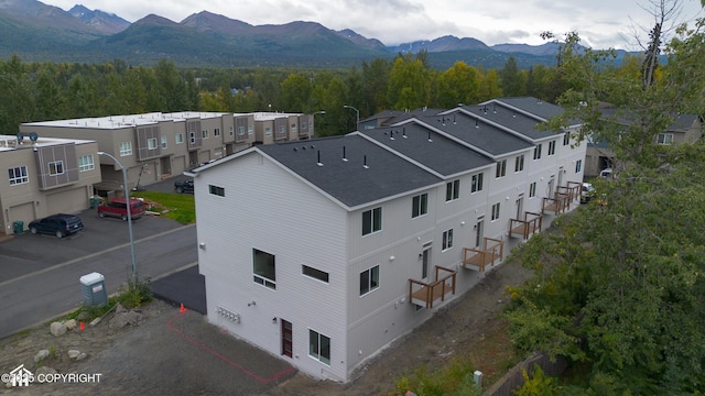 3680 Little Bear Pl Unit 8, Anchorage, AK 99504 - aerial view of property and surrounding area featuring a mountain backdrop