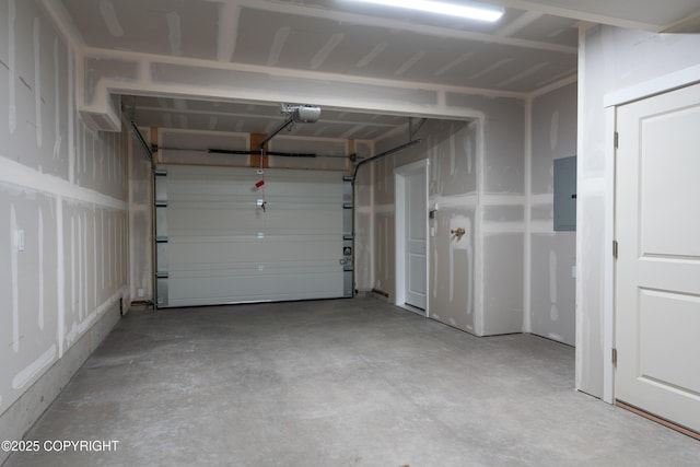 3680 Little Bear Pl Unit 8, Anchorage, AK 99504 - garage featuring a garage door opener and electric panel