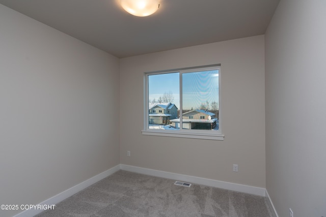 3680 Little Bear Pl Unit 8, Anchorage, AK 99504 - carpeted spare room featuring baseboards