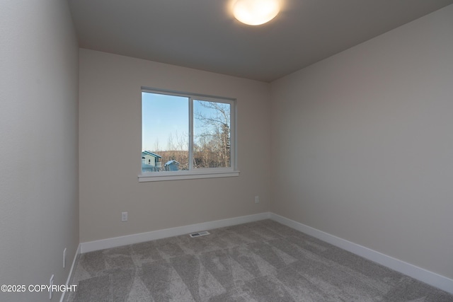 3680 Little Bear Pl Unit 8, Anchorage, AK 99504 - spare room with carpet flooring and baseboards