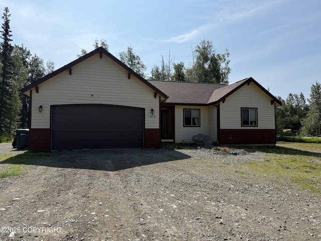 1880 E Bald Eagle Cir, Wasilla, AK 99654 - single story home with brick siding, a garage, and dirt driveway