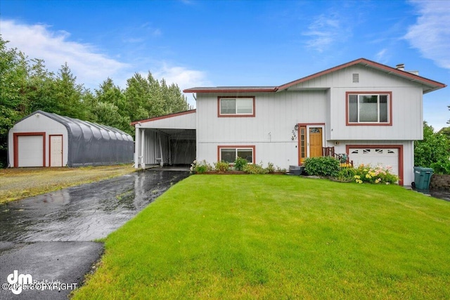 3041 W 91st Ave, Anchorage, AK 99502 - split foyer home with driveway and a front lawn