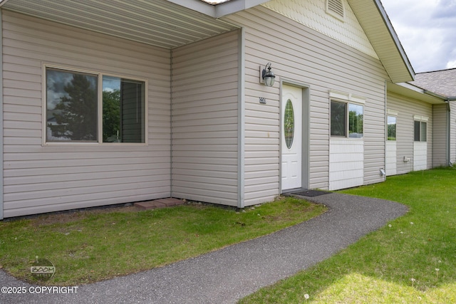 230 W Fallen Leaf Cir, Wasilla, AK 99654 - view of home's exterior featuring a lawn