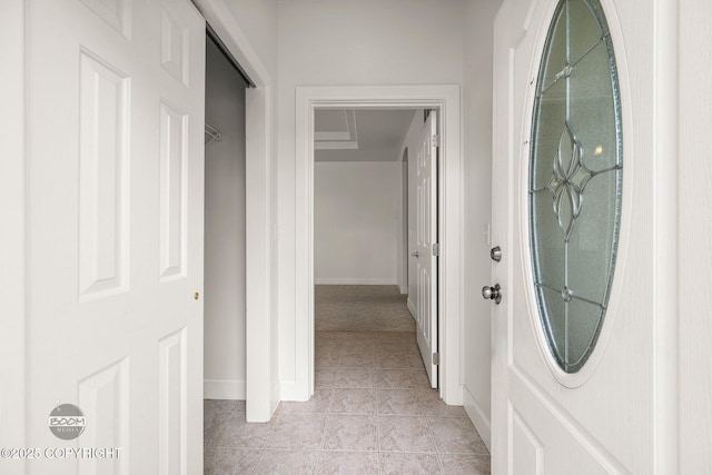 230 W Fallen Leaf Cir, Wasilla, AK 99654 - corridor with baseboards and light tile patterned flooring