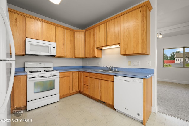 230 W Fallen Leaf Cir, Wasilla, AK 99654 - kitchen with white appliances, light floors, and light carpet