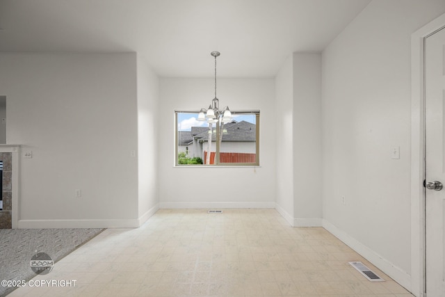 230 W Fallen Leaf Cir, Wasilla, AK 99654 - unfurnished dining area with tile patterned floors and a chandelier