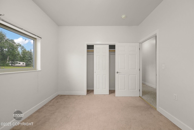 230 W Fallen Leaf Cir, Wasilla, AK 99654 - unfurnished bedroom with carpet floors and a closet