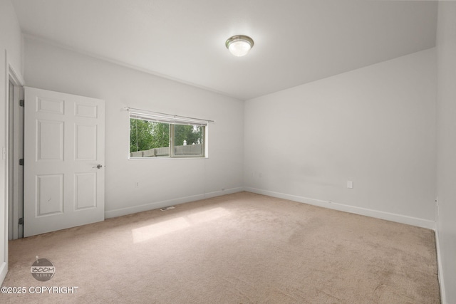 230 W Fallen Leaf Cir, Wasilla, AK 99654 - spare room featuring carpet flooring