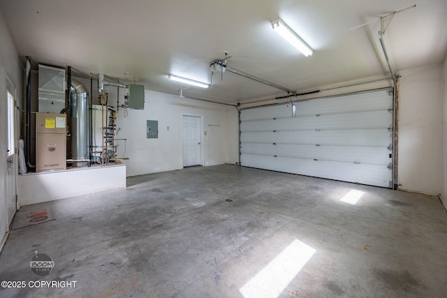 230 W Fallen Leaf Cir, Wasilla, AK 99654 - garage featuring electric panel and heating unit