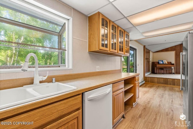 13440 Diggins Dr, Anchorage, AK 99515 - kitchen with dishwasher, light wood-style floors, plenty of natural light, and vaulted ceiling