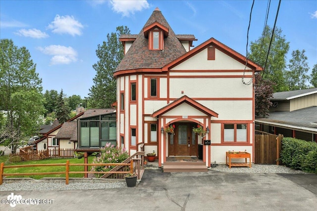 1535 M St, Anchorage, AK 99501 - tudor-style house with stucco siding