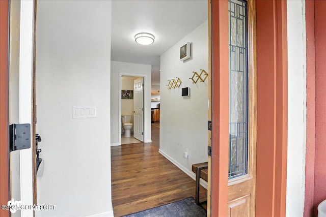 1535 M St, Anchorage, AK 99501 - foyer entrance with wood finished floors and baseboards