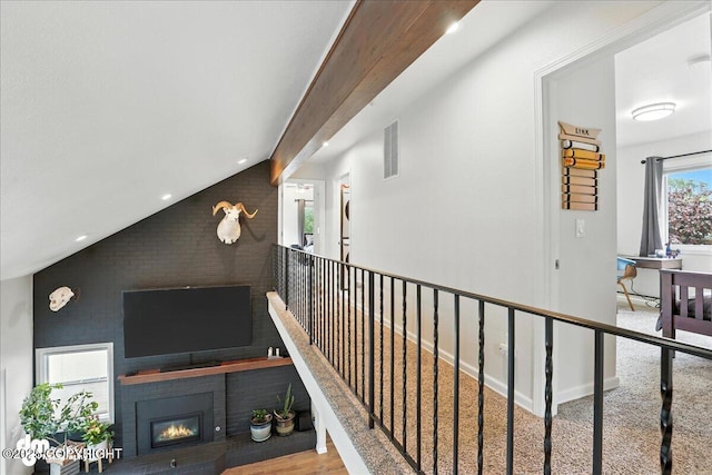 1535 M St, Anchorage, AK 99501 - stairs with a fireplace, brick wall, and recessed lighting