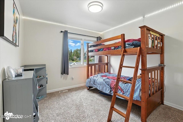 1535 M St, Anchorage, AK 99501 - carpeted bedroom with baseboards