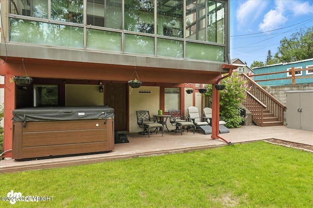 1535 M St, Anchorage, AK 99501 - back of property featuring a hot tub, a wooden deck, a yard, and stairs