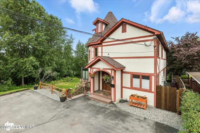 1535 M St, Anchorage, AK 99501 - tudor house featuring a patio and stucco siding