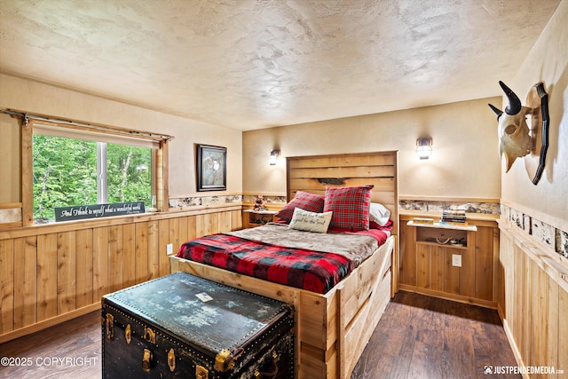 29416 W Deshka Landing Rd, Willow, AK 99688 - bedroom featuring dark wood finished floors, a wainscoted wall, and wood walls