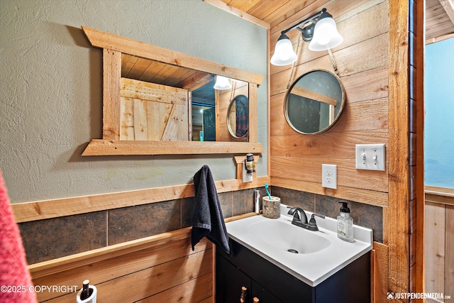 29416 W Deshka Landing Rd, Willow, AK 99688 - bathroom with a textured wall, vanity, and wooden ceiling
