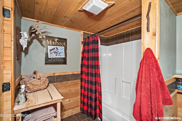 29416 W Deshka Landing Rd, Willow, AK 99688 - full bath featuring wooden ceiling, shower / bath combo with shower curtain, and tile patterned flooring