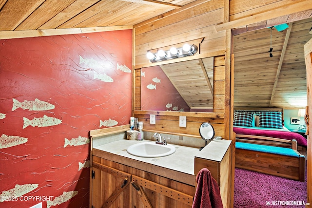 29416 W Deshka Landing Rd, Willow, AK 99688 - bathroom featuring wood ceiling, vanity, and wood walls