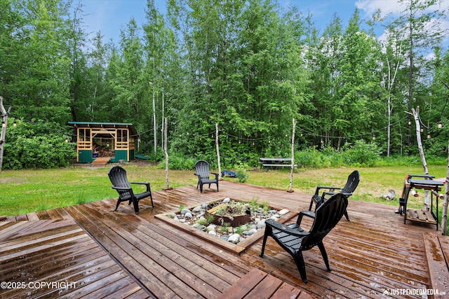29416 W Deshka Landing Rd, Willow, AK 99688 - wooden deck featuring a lawn and an outdoor structure