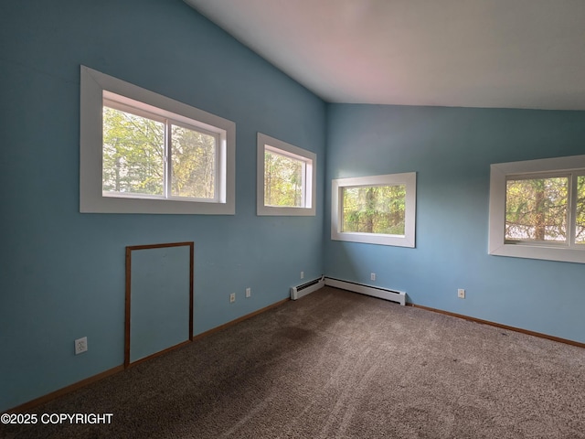 297 Mitkof Hwy, Petersburg, AK 99833 - unfurnished room with baseboard heating, healthy amount of natural light, and carpet flooring