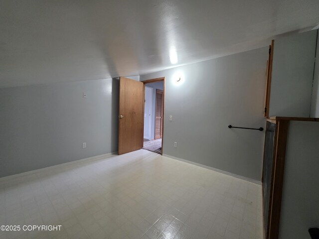 297 Mitkof Hwy, Petersburg, AK 99833 - spare room featuring tile patterned floors and baseboards
