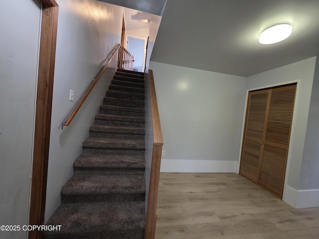 297 Mitkof Hwy, Petersburg, AK 99833 - staircase with wood finished floors and baseboards