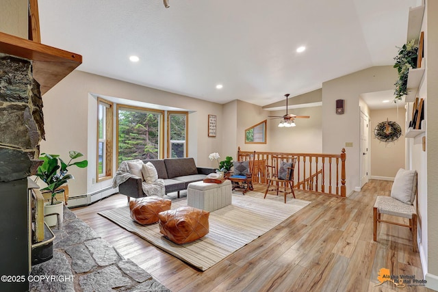 22479 Centurion Dr, Chugiak, AK 99567 - living area with a ceiling fan, light wood finished floors, baseboard heating, recessed lighting, and lofted ceiling