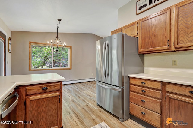 22479 Centurion Dr, Chugiak, AK 99567 - kitchen featuring stainless steel appliances, a baseboard heating unit, light wood-style flooring, and light countertops