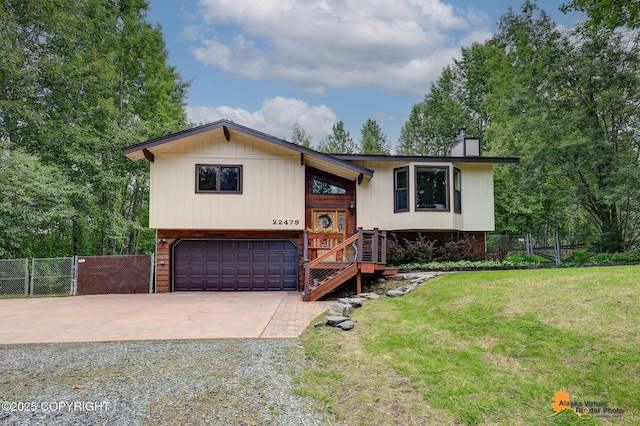 22479 Centurion Dr, Chugiak, AK 99567 - bi-level home with driveway, an attached garage, and a chimney