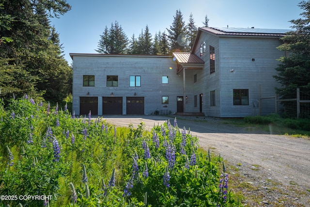 2500 W Highland Dr, Homer, AK 99603 - view of property with dirt driveway and a garage