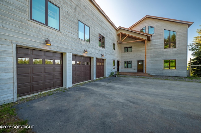2500 W Highland Dr, Homer, AK 99603 - view of front of house with driveway and an attached garage