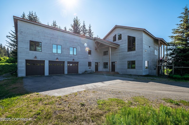 2500 W Highland Dr, Homer, AK 99603 - view of front of house with driveway and a garage