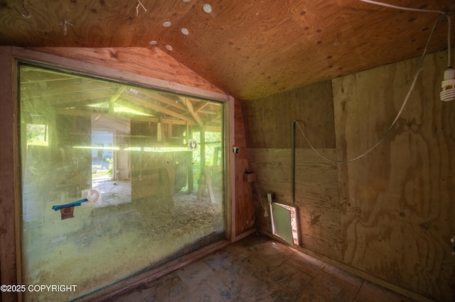 2500 W Highland Dr, Homer, AK 99603 - unfurnished room with lofted ceiling and wooden walls