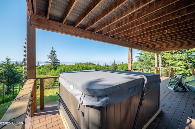 2500 W Highland Dr, Homer, AK 99603 - wooden terrace featuring a hot tub, a grill, and view of scattered trees