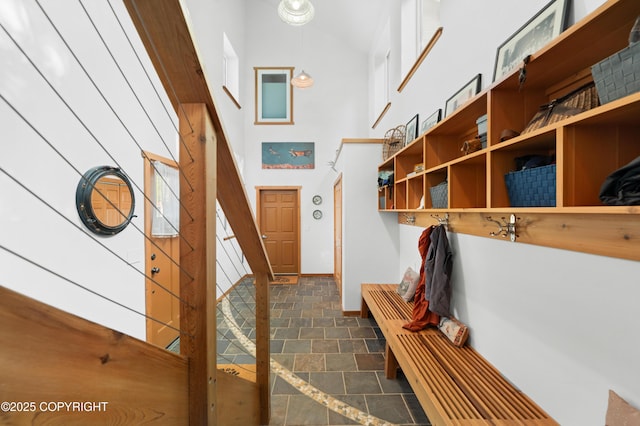 2500 W Highland Dr, Homer, AK 99603 - mudroom with stone finish flooring and a towering ceiling