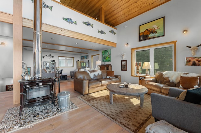 2500 W Highland Dr, Homer, AK 99603 - living room featuring wooden ceiling, decorative columns, wood finished floors, and a high ceiling