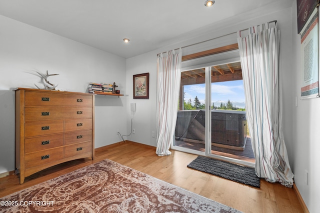 2500 W Highland Dr, Homer, AK 99603 - interior space with wood finished floors and recessed lighting