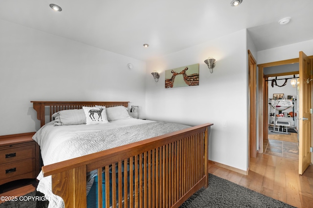 2500 W Highland Dr, Homer, AK 99603 - bedroom featuring wood finished floors and recessed lighting