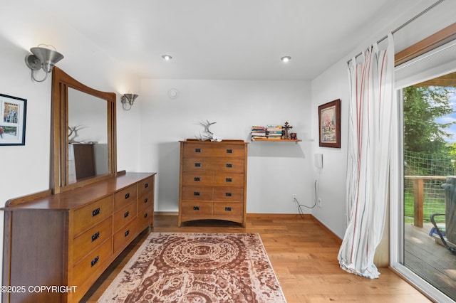 2500 W Highland Dr, Homer, AK 99603 - bedroom featuring access to exterior, light wood-style floors, and recessed lighting