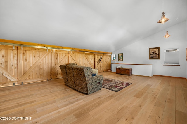 2500 W Highland Dr, Homer, AK 99603 - sitting room featuring lofted ceiling and light wood-style flooring