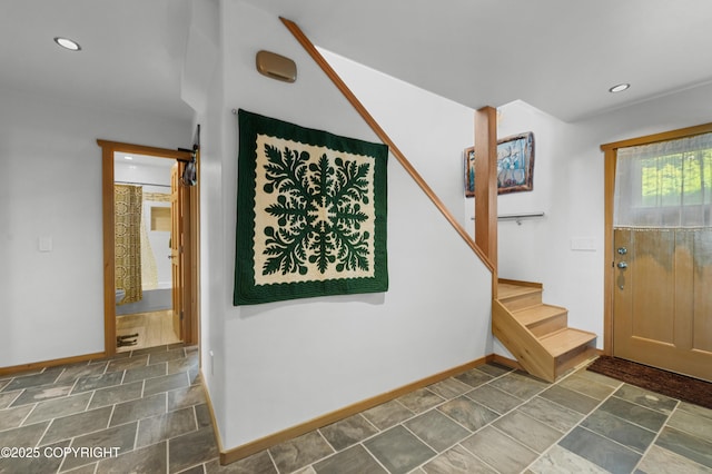 2500 W Highland Dr, Homer, AK 99603 - foyer entrance with stone finish floors, recessed lighting, and stairs