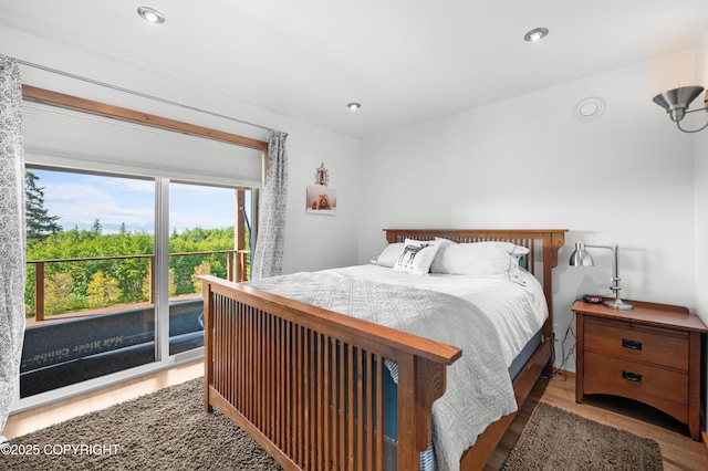 2500 W Highland Dr, Homer, AK 99603 - bedroom featuring wood finished floors and recessed lighting
