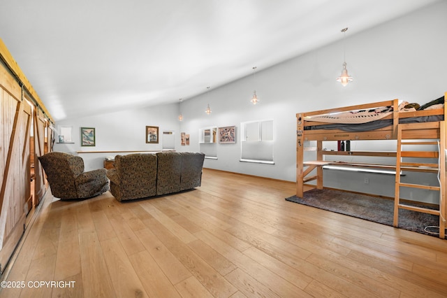 2500 W Highland Dr, Homer, AK 99603 - living room with lofted ceiling and hardwood / wood-style flooring