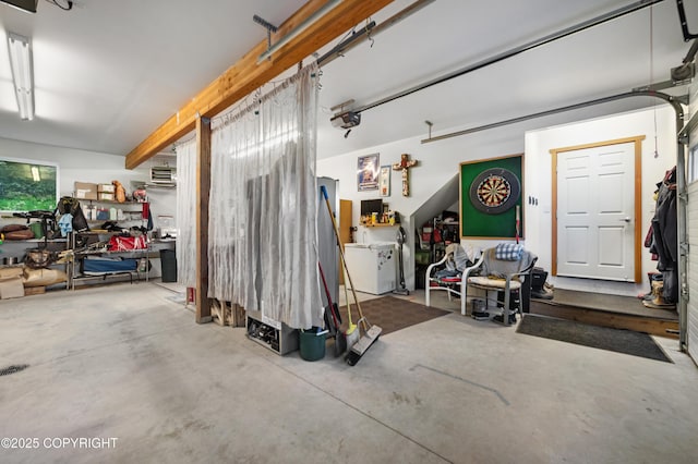 2500 W Highland Dr, Homer, AK 99603 - garage with a garage door opener and washer / dryer